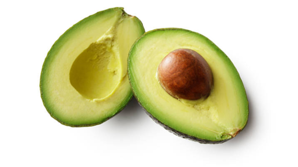 Avocado on a wooden cutting board