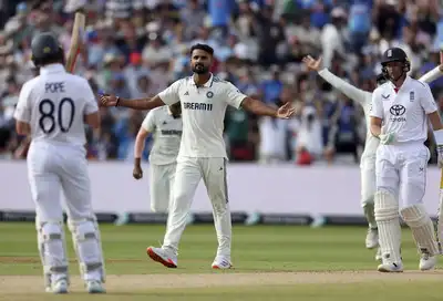 Akash Deep celebrates dismissing Joe Root.