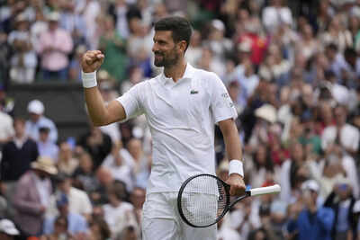 Novak Djokovic celebrates his victory at Wimbledon 2025