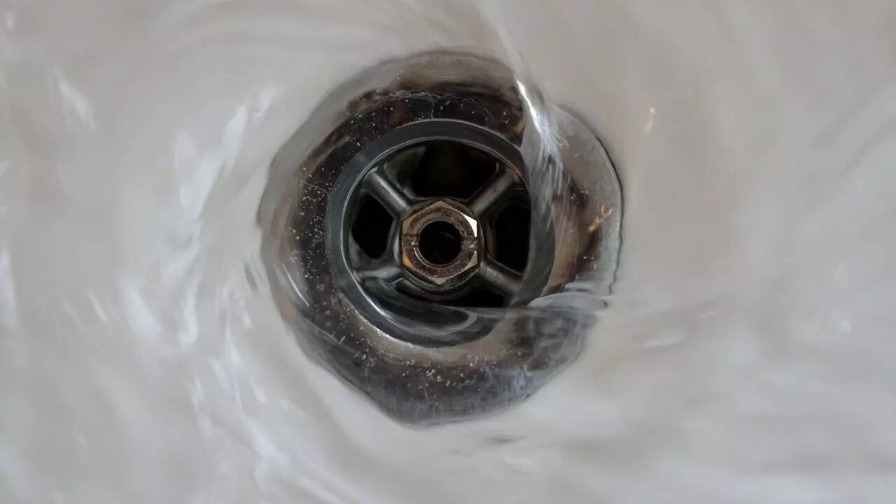 Why boiling water and salt work to clear a clogged sink